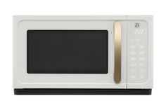 a white microwave oven with gold trimmings on the front and side panel, against a white background