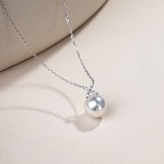 Material: 18K white gold, South Sea Pearl, and diamond South Sea saltwater cultured pearl Size of pearl: around 11.0-12.0 mm Length of chain: around 44 cm (adjustable) Weight of Diamonds: 4 diamonds approx. 0.198 carats Handpicked of every pearl, only the top 1% of pearls are selected Handcrafted Lifetime warranty Discount codes are not available for this product. Luxury White Pearl Necklace With Clavicle Chain, White Luxury Pearl Necklace With Clavicle Chain, Luxury Silver Pearl Chain Necklace, Sterling Silver White Gold Pearl Necklace, Sterling Silver Pearl Necklace In White Gold, Luxury Pearl White Necklace With Pearl Pendant, White Gold Pearl Necklace With Sterling Silver, Luxury Silver Pearl Pendant Necklace, Elegant Silver Pearl Necklace With Clavicle Chain