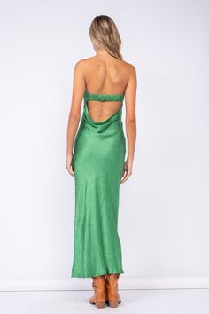 Final Sale - Get it before it's gone! Go to your next formal event wearing the Marla Green Floral Satin Strapless Maxi Dress! Green floral satin fabric shapes this maxi dress with a strapless neckline and an open back. Features a ruched elastic strap in the back - style with your favorite heels and jewelry for a chic formal look! DETAILS & FIT S: 50" Length, " 29 Bust, 28" Waist, 34" Hips M: 51.5" Length, 30" Bust, 30" Waist, 36" Hips L: 52" Length, 31" Bust, 32" Waist, 38" Hips 55% Viscose, 45% Satin Floor-length Maxi Dress With Ruched Back, Fitted Backless Maxi Dress With Satin Finish, Fitted Satin Finish Backless Maxi Dress, Spring Strapless Backless Satin Dress, Backless Satin Maxi Dress For Gala, Backless Satin Maxi Dress For Prom Season, Satin Maxi Dress With Ruched Back For Gala, Satin Backless Maxi Dress For Night Out, Party-ready Bias Cut Halter Maxi Dress