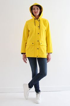 I am Jacques, a classic raincoat with a hood. My zipper is hidden by a button placket which closes with snap fasteners. I have two big patched pockets to carry your essentials. I am fully lined and you can sew me in 3 different lengths. In a raincoat fabric, I am a staple for the seaside and in other fabrics I’ll be pe Hooded Yellow Raincoat For Fall, Yellow Hooded Raincoat For Fall, Yellow Raincoat With Pockets For Fall, Rainy Season Parka With Pockets, Hooded Raincoat With Double-lined Hood, Hooded Weatherproof Raincoat For Work, Yellow Outerwear For Rainy Fall Weather, Yellow Hooded Rainy Season Outerwear, Yellow Weatherproof Raincoat For Fall