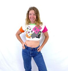 "By Break Out Fun kids size top that fits like a womens XS cropped tee! 50/50 poly cotton Great vintage shape. Lying flat... ~17\" armpit to armpit ~14\" top to bottom" Retro Patchwork T-shirt For Spring, 90s Style Crop Top T-shirt For Spring, 90s Cropped Summer T-shirt, 90s Style Spring Crop Top T-shirt, 90s Cropped T-shirt For Summer, Retro Cotton Cropped T-shirt With Crew Neck, Retro Cropped Cotton T-shirt With Short Sleeves, 90s Style Cropped T-shirt For Summer, Retro Cotton Cropped T-shirt With Short Sleeves