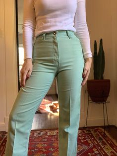 "Vintage mint green Levis pants- linen style fabric. Super comfortable and flattering cut- these seem to be a rare find! Measurements: Wait 26\" Rise 12\" Inseam 28\" Hip 32\" *Please note that the above measurements were taken by me, I do not rely on sizing information provided on garment tags." Green Stretch Wide Leg Jeans, Green Relaxed Fit Straight Pants, Green Relaxed Fit Pants, Green Full Length Jeans For Summer, Green Relaxed Fit Tapered Leg Jeans, Green Relaxed Fit Straight Leg Bottoms, Green Straight Leg Bottoms With Relaxed Fit, Green High-waisted Cotton Bottoms, Green Cotton High-waisted Pants