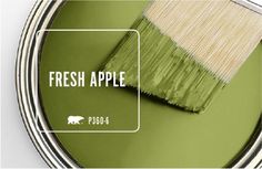 a green paint with the words fresh apple on it