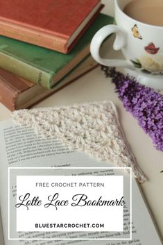 a cup of coffee sitting on top of an open book next to a crochet pattern