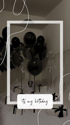 black and white balloons in a room with the words it's my birthday above them