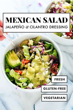 mexican salad with jalapeno and cilantro dressing in two white bowls