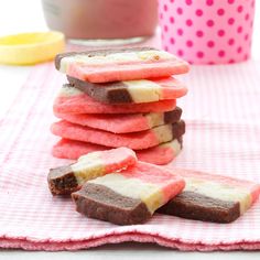 a stack of ice cream sandwiches sitting on top of a pink towel