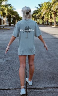 "summer vibes oversized comfort colors top | sunkissed beach tees | hot summer tees | hipster beach crewneck | 2023 summer crewneck | VSCO Introducing our Comfort Colors Crewneck with the fun and playful text \"Summer Vibes\". This oversized tee is the perfect addition to your summer wardrobe for the 2023 season. Whether you're a hipster, surfer, or just looking for a comfortable and stylish outfit, this crewneck is the perfect fit. Made with high-quality materials, this crewneck features an oversized fit that adds a relaxed and laid-back feel to your outfit. The \"Summer Vibes\" text adds a fun and carefree touch to your look, reminding you to enjoy the sun and embrace the spirit of the season. Designed to keep you comfortable in the hottest summer weather, this crewneck is made from the Beachy Tees, Comfy Summer Fits, Summer Nyc Outfits, Oversized Tshirt Outfit Summer, Beach Tees, Nyc Outfits Summer, Summer Work Outfits Office, Beach Crewneck, Church Outfit Casual