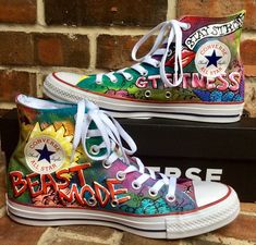 Custom hand painted converse chuck taylor high tops designed totally for your beast mode spirit at the gym or just for fun! I designed this pair of Chucks for a client who loves color, loves sugar skulls, owns a gym, and is a power lifter. What I am offering to you is a chance to get shoes personally designed just for you! You tell me the things that you LOVE, send me pictures and ideas and color choices, and I will take those ideas and run with them! Such a fantastic was to show off your person Custom Converse Shoes Stadium Goods, Custom Shoes Iron Maiden, Cool Converse High Tops With Fun Treatments, Converse Custom Art Rainbow, Diy Galaxy Shoes, Alt Shoes, Cool Converse, Painted Converse, Galaxy Shoes