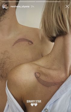 a man and woman with tattoos on their chests