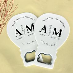 two personalized wedding fan shaped bottle openers