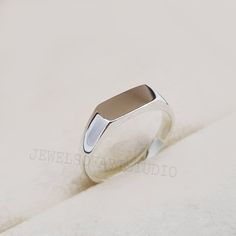 Dainty Bar Signet Ring -Sterling Silver Ring -Rectangle Bar Ring -Silver Geometric Ring -Flat Bar Ring -Simple Classic Ring- Love Gift Idea Hypo Allergenic, Nickel Free, Processed with Anti Tarnished, Genuine 925 Sterling Silver with Stamp, Quality Assured Products All our jewelry are plated with 14K micron gold and 100% nickel free. We assure you best quality. >Personalization * Please select your desired Ring size from the menu. >Product Details * Material: 925 Sterling Silver * Finish: Silver Rectangular Sterling Silver Signet Ring For Anniversary, Minimalist Everyday Ring With Rectangular Stone, Minimalist Everyday Rings With Rectangular Stone, Minimalist Stackable Rings With Rectangular Stone, Rectangular Sterling Silver Engraved Ring For Anniversary, Sterling Silver Engraved Rectangular Ring For Anniversary, Silver Square Promise Ring, Silver Rings For Anniversary, Stackable Rectangular Sterling Silver Jewelry