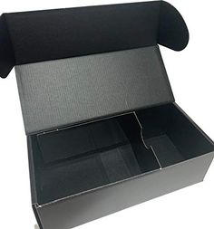 an open box that is sitting on a white surface