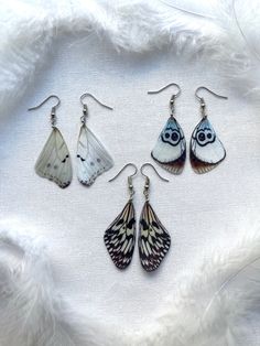 These Black and White Butterfly Wings Earrings are the perfect addition to any boho jewelry collection. Handmade with care and attention to detail, these earrings are both stylish and unique. The intricate butterfly design is sure to catch the eye, and the black and white color scheme adds a touch of elegance to these quirky earrings.Crafted from lightweight materials, these earrings are comfortable to wear and won't weigh you down. The silk butterfly wings are delicate and beautiful, adding a t Butterfly Wings Earrings, Fairy Wing Earrings, Magic Wings, Butterfly Wing Jewelry, Love Butterflies, Silk Butterfly, Wings Earrings, Enchanted Fairy, Boho Chique