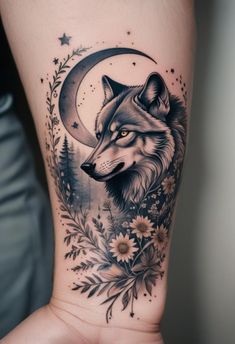 a tattoo with a wolf on it's arm and flowers in the foreground