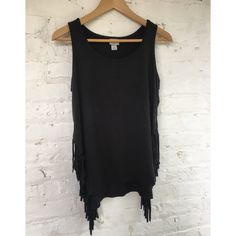 Black Suede Like Top With Fringe Partially Up Both Sides. Slits Somewhat Up Sides As Well. Very Flattering And Never Worn But Tags Removed. Fitted Casual Tank Top With Fringe, Casual Fitted Fringe Tank Top, Summer Stretch Fringe Tops, Sleeveless Black Top With Fringe, Both Sides, Black Suede, Womens Tops, Tank Tops, Tags