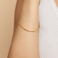 #All Full of vintage allure, our Now & Forever Herringbone Bracelet is a modern take on a true classic. Three petite herringbone chains weave together to form a chic braid of solid gold. The Finer Points: #YellowGold-10kSolidGold-75 Metal: 10k Solid Yellow Gold Dimensions: 3.4mm Wide, 7.5-Inches Long Weight: 2.7 Grams Solid Gold Origin: Crafted in Istanbul, Turkey #TricolorGold-10kSolidGold-75 Metal: 10k Solid Tricolor Gold Dimensions: 3.4mm Wide, 7.5-Inches Long Weight: 2.7 Grams Solid Gold Ori Elegant Adjustable Gold Bracelet With Curb Chain, Gold Plated Curb Chain Bracelets, Elegant Curb Chain Bangle, Dainty Jewelry With Curb Chain, Modern Twist Everyday Bracelet Jewelry, Adjustable Curb Chain Bracelets, Modern Twist Everyday Bracelet, Elegant Gold Curb Chain Bangle Bracelet, Elegant Gold-plated Curb Chain Bracelet