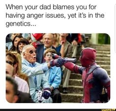 an older man in a suit and sunglasses is pointing at the deadpool on his arm