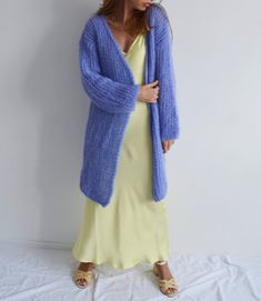 Hello, I'm the one, who won't let you down - emboidered blue mohair cardigan. I will comfort you, keep you warm and will make you smile. I'm 100% hand made and proud of that. I consist of 70% italian kid mohair and 30% of nylon, which makes me incredibly natural. I'm quite unique as could be worn all year long. I'm in really difficult and at the same time beautiful color, something between blue and light purple. I'm in one size and one size fits all because my measurements are : ❤️ Width -50 cm Fitted Mohair Cozy Cardigan, Cozy Handmade Fitted Cardigan, Handmade Fitted Cozy Cardigan, Fitted Mohair Cozy Outerwear, Winter Purple Open Front Cardigan, Winter Hand Knitted Purple Cardigan, Handmade Fitted Winter Cardigan, Purple Open Front Winter Outerwear, Handmade Purple Winter Cardigan