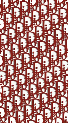 a red and white pattern with many faces