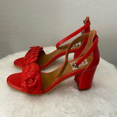 They Were Never Worn. Size: 6.5 Color: Orange/Red Leather Spring Leather Heels With Red Sole, Red Heels With Heel Strap For Spring, Red Sandals With Sculpted Low Heel, Formal Spring Heels With Red Sole, Formal Red Heels With Stacked Heel, Formal Red Sole Heels For Spring, Red Sandals With Stacked Heel For Evening, Red Evening Sandals With Stacked Heel, Red Low Heels With Sculpted Heel