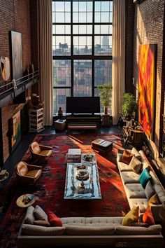 a living room filled with lots of furniture next to a large window covered in windows