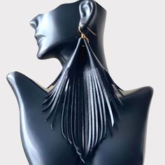 You'll love these long black  leather earrings cut into stylish fringes. They are made with genuine black leather. The leather is lightweight and easy to wear. They are fun and stylish, yet sophisticated and boho chic. High quality lightweight leather with matching black backside. Gold plated nickel free ear wire. Choose your size: 4-10" Purchase for yourself or gift these fringe leather earrings. You may also like: https://www.etsy.com/listing/1489094353/leopard-leather-fringe-statement?click_k Elegant Leather Fringe Jewelry, Party Leather Dangle Earrings, Black Fringe Earrings For Party, Party Black Fringe Earrings, Black Tassel Earrings For Evening, Black Fringe Dangle Earrings, Black Fringe Jewelry, Black Tassel Earrings For Party, Black Fringe Jewelry For Festival