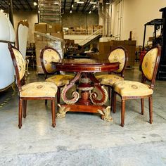 a dining table and chairs in a warehouse