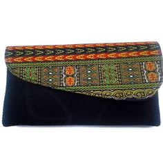 split This is the perfect clutch for every woman’s outfit. It fits all your essentials - Nothing more, nothing less. It is a perfect gift to self or to another woman in your life! It was handcrafted in Kenya using burlap and Kente (African print) fabric Length: 10.5 Inches Width: 5.5 inches ***The clutch pattern is on the black image. Handmade Green Bohemian Clutch, Black Clutch As A Gift, Elegant Handmade Black Clutch, Elegant Black Handmade Clutch, Formal Multicolor Handmade Clutch, Traditional Black Clutch, Trendy Handmade Multicolor Clutch, Bohemian Black Clutch For Everyday Use, Chic Handmade Multicolor Clutch