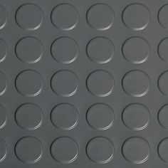 an image of a metal surface with circles on it