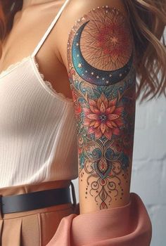 a woman's arm with a tattoo on it and a flower in the middle