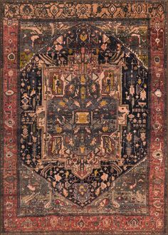 an antique rug with many different colors and patterns