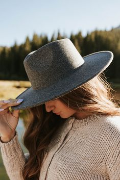 THIS SALE ITEM IS FINAL SALE! Every mom uniform checklist HAS to include the Sierra Hat. This charcoal-colored felt hat comes with a flat wide brim, and a comfortable crown. This color is neutral and we can't think of any outfit this hat will not go well with. Sierra Hat-Charcoal, boutique clothing, casual, the perfect hat! Boutique Clothing Hat Boutique, Mom Uniform, Clothing Casual, Felt Hat, Wide Brimmed, Boutique Clothing, Floppy Hat, Cowboy Hats, Sale Items