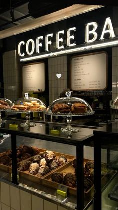 a coffee bar filled with lots of pastries