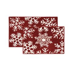 two red and white snowflake rugs