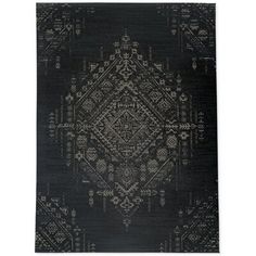 a black and white rug with an intricate design