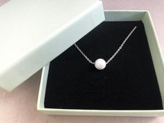 Welcome to our shop,  This necklace has 1x 8mm round white howlite bead on a silver colour stainless steel chain with spring ring. The lava necklace comes in a cardboard FREE GIFT BOX. Please choose your prefeRred chain length, 16 inches ( 40,5cm), 18 inches (45,5 cm ) or 20 inches (50,5cm).  Taking care of your jewellery:  1. Please take off jewellery when going to sleep, or to  shower or to the pool.  2. Keep the jewellery in a cool dry place.  3. Avoid contact with chemical or perfume.  Did you know?  - Howlite strengthens memory and stimulates desire for knowledge. It teaches patience and helps to eliminate rage, pain and stress. A calming stone, Howlite calms communication, facilitates awareness and encourages emotional expression. Howlite balances calcium levels in the body. Please f Lava Necklace, Howlite Jewelry, Howlite Necklace, Aromatherapy Jewelry, Gift Valentines Day, Raw Crystal Necklace, Friendship Jewelry, Healing Necklace, White Howlite