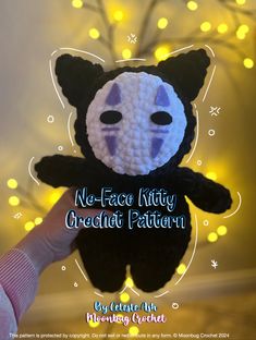 a crocheted black and white panda bear with the words no - face kitty credit pattern on it