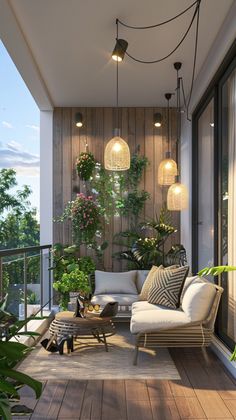 an outdoor living room with plants and lights hanging from the ceiling, on top of a wooden deck