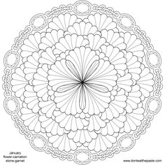 an intricate circular design in black and white