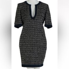 A Classic Chanel Paris French Designer Ladies Short Sleeve Tweed Sheath Dress. Features Blue Suede Leather Trim, With A V Neck Design, Lime Green, Blue And White Tweed, Accented With A Single Enameled Button At One Side Of The Dress. Made Of Wool, Silk And Lambskin. Retains Original Labels And A $3900 Price. Elegant Blue Tweed Dress, Fitted Tweed V-neck Mini Dress, Elegant Short Sleeve Tweed Mini Dress, Elegant V-neck Tweed Mini Dress, Fitted V-neck Tweed Dress For Formal Occasions, Fitted Tweed V-neck Dress, Elegant Blue Tweed Dress For Formal Occasions, Elegant Tweed V-neck Dress, Chanel Sweater Dress