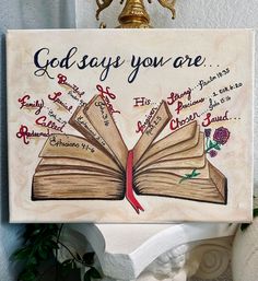 an open book with the words god says you are on it