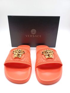 Luxury Slip-on Slides For Spring, Luxury Slides With Cushioned Footbed, Luxury Open Toe Slippers With Branded Insole, Designer Cushioned Slides Slip-on, Designer Cushioned Slip-on Slides, Designer Slide Sandals With Cushioned Footbed, Luxury Slip-on Summer Slippers, Designer Summer Slides With Cushioned Footbed, Designer Beach Slides With Cushioned Footbed