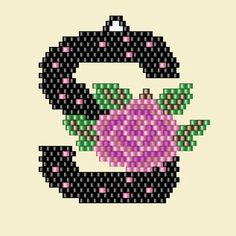 a cross stitch pattern with the letter c in pink, green and purple flowers on it