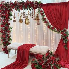 a red and white wedding decorated with flowers