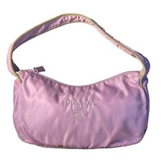 Authentic Prada Nylon Hobo Shoulder Bag In Beautiful Purple-Pink Color. Comes With A Dust Bag And Authenticity Card. This Is A Medium Size Bag, Lightweight, Very Roomy And Stylish. There’s Light Signs Of Wear Like Light Stains And Some Discoloration And A Little Keeping/Storage Smell Overall In Very Good Pre-Owned Condition. Made In Italy. *Color May Differ Due To Lighting. Size (Approximately) Height- 7.5 Inches Width- 11.5 Inches Depth- 3.7 Inches Please Check All Photos And Video As It Is Par Prada Pink, Bags Prada, Purple Pink Color, Nylon Shoulder Bag, Prada Nylon, Hobo Shoulder Bag, Light Stain, Black Friday Sale, Medium Size