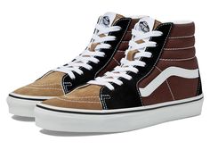 Vans Sk8-Hi - Skate Shoes : Color-Block Black/Brown : Keep it old school every step of the way with the classic Vans SK8-Hi skateboard shoes! High-top skate shoes with a classic silhouette and Sidestrap detail. Uppers of suede, leather, or canvas. Cotton drill lining. Padded collar for added comfort and support. Triple-stitch collar adorns collar. Side stripes, timeless vibes wearing Vans U SK8-HI: the legendary high-top shoe. Crafted with durable suede and canvas uppers, cotton lining, and rein Brown Urban Sneakers For Winter, Urban Brown Winter Sneakers, Vans Brown High-top Sneakers, Brown High-top Vans Sneakers, Vans Brown Skate Shoes With Rubber Sole, Sporty Brown Vans Skate Shoes, Urban Brown Vans Sneakers, Brown Sneakers For Winter Streetwear, Brown Winter Sneakers For Streetwear