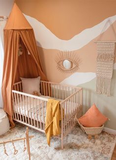 a baby's room decorated in neutral colors