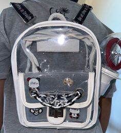 "PREORDER NOW Shipping will begin in August 2023 New Stray Kids inspired stadium backpack featuring PU leather with canvas material on the backpack straps. Features white Velcro straps on the side to strap in your light stick to be concert ready!! Comes with a black and white chain and removable insert in the first pocket for pin display! All backpacks feature add on customizable chain! Please enter \"I understand\" into the personalization box and message me with your order number for what you White Backpack With Zipper Closure For Streetwear, White School Bag With Clear Strap, Trendy School Backpack With Clear Strap, White Backpack For Streetwear, White Bags For Streetwear And Back To School, White Bags For Back To School Streetwear, White Zipper Closure Bag For Streetwear, White Backpack For Back To School Streetwear, White Standard Backpack For Streetwear