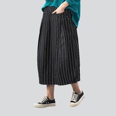 Make a statement in the 2023 Autumn Collection with this striped long women's denim skirt! Turn heads and channel the spirit of the millennium with this Y2K-inspired creation. boasting a high-waisted cut. sanded finish. and rubber closure. A unique blend of vintage and modern. this skirt promises to elevate your look with effortless sophistication.Why You'll Fall In LoveThis skirt is a timeless classic. offering a high-waisted silhouette with a unique. Y2K-inspired charm. Its vertical stripes. s Baggy Striped Bottoms For Spring, Trendy Cotton Midi Bottoms, Trendy Cotton Midi-length Bottoms, Trendy Midi Bottoms With Pockets, Trendy Midi Length Cotton Bottoms, Trendy Midi-length Cotton Bottoms, Spring Relaxed Fit Bottoms With Vertical Stripes, Black Relaxed Fit Midi Skirt, Black Midi-length Bottoms With Pockets